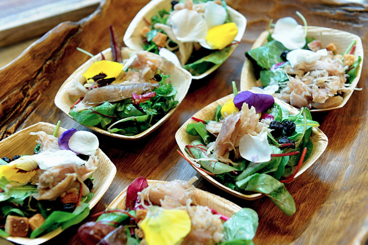 Roots of America rabbit co<em></em>nfit foraged green salad with whiskey grain crumb and Madeira brown butter vinaigrette