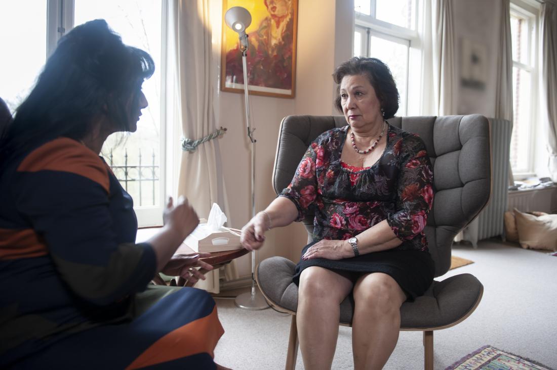 Mature senior woman havin<em></em>g counseling or CBT therapy in psychotherapists office.