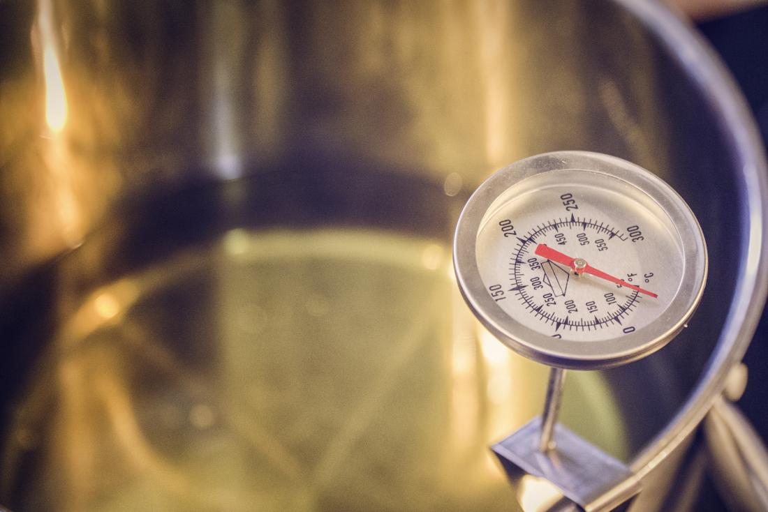 temperature gauge and oil in a pan