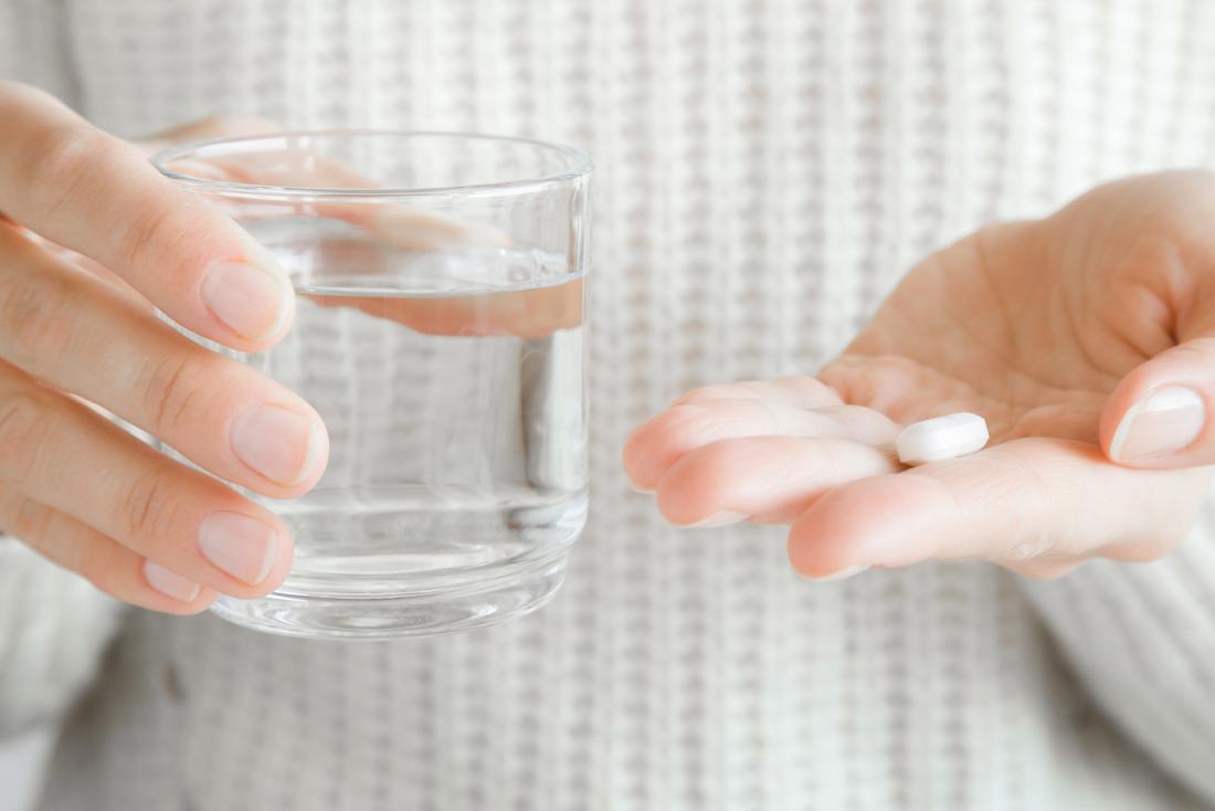 taking an antibiotic for a tooth infection