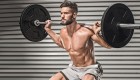 Shirtless Man Doing Barbell Back Squat