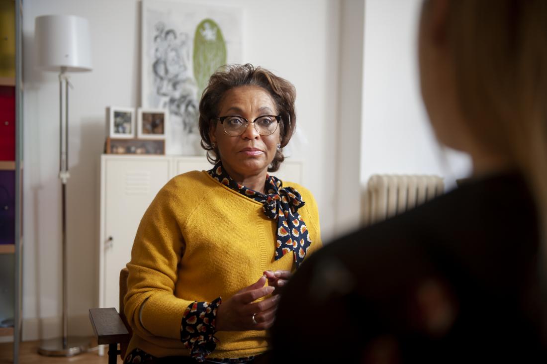 Therapist in counseling session talking with patient