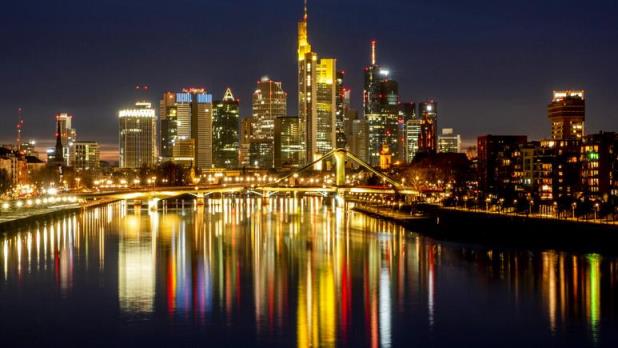 The lights of the bridges and buildings are reflected in the river Main in Frankfurt, Germany. Europe’s eco<em></em>nomy has rebounded into growth in the second quarter of 2021