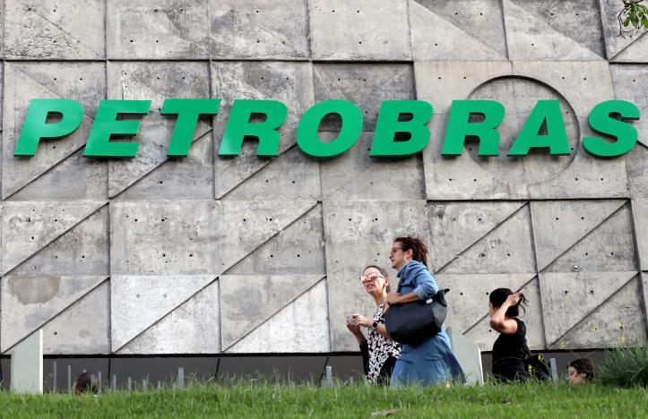 People walk in front of the Brazil's state-run Petrobras oil company headquarters in Rio de Janeiro, Brazil, October 16, 2019. Picture taken October 16, 2019. REUTERS/Sergio Moraes//File Photo/File Photo/File Photo
